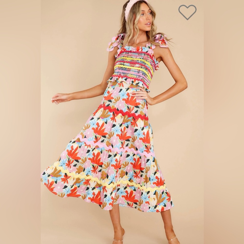 Celia B Nilsia summer dress with smocking with tied straps in a fun floral. Xs
